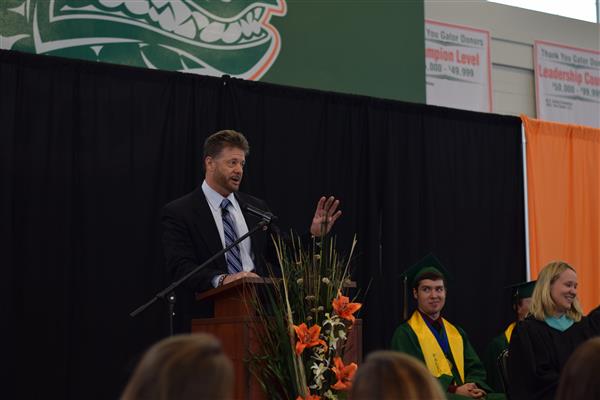 man-speaking-at-podium